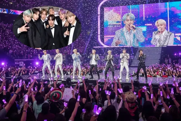 Imagen del grupo BTS en concierto, con la multitud de ARMY México de fondo, ilustrando el furor descrito en los datos curiosos de BTS.